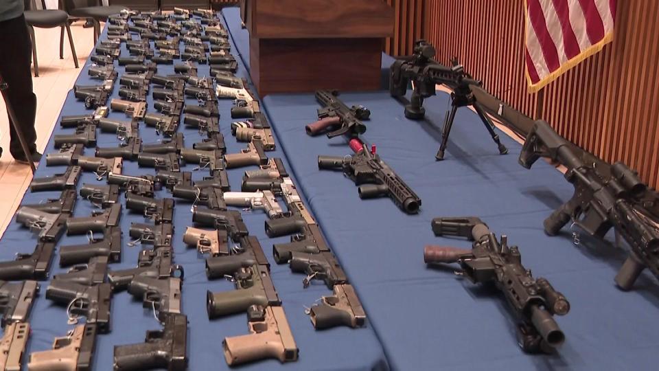 New York City Mayor Eric Adams displays dozens of ghost guns recovered by the NYPD. May 2022. / Credit: CBS New York