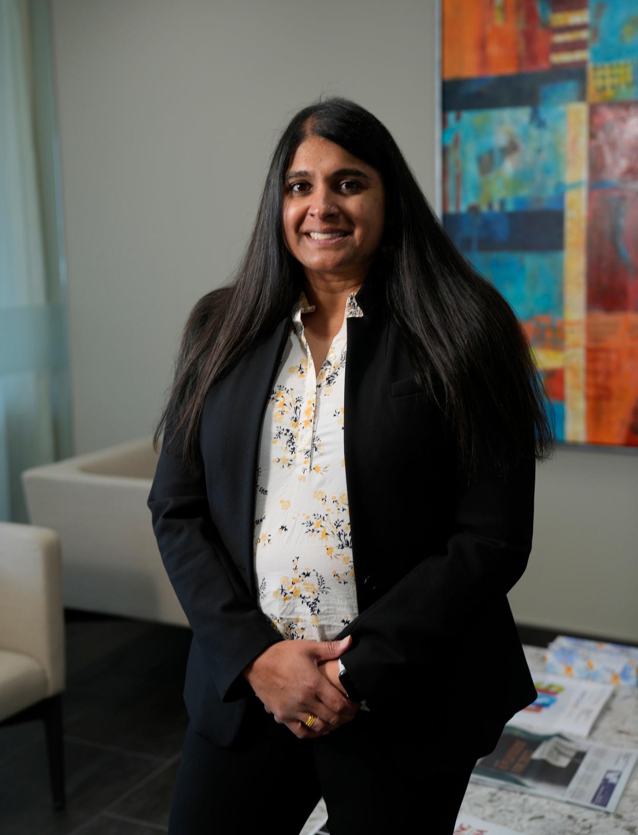 Roopali Desai stands in her office at Coppersmith Brockelman PLC in Phoenix on Feb. 1, 2022.