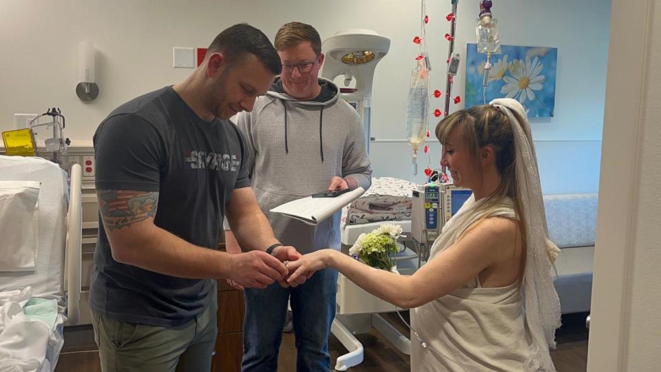 PHOTO: Sara and Brandon Perry married on Feb. 13 at Saint Luke’s East Hospital, where Sara had been admitted after her water broke at 35 weeks. (Courtesy of Saint Luke’s East Hospital)