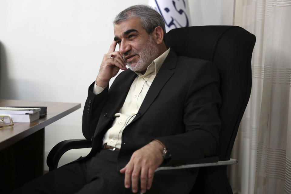 In this Nov. 9, 2019, photo, Abbas Ali Kadkhodaei, a prominent member of Iran's powerful Guardian Council, listens to a question during an interview with The Associated Press, in Tehran, Iran. A prominent member of Iran’s powerful Guardian Council has told The Associated Press that the Islamic Republic should stop honoring the terms of its collapsing 2015 nuclear deal with world powers amid tensions with the U.S. (AP Photo/Vahid Salemi)