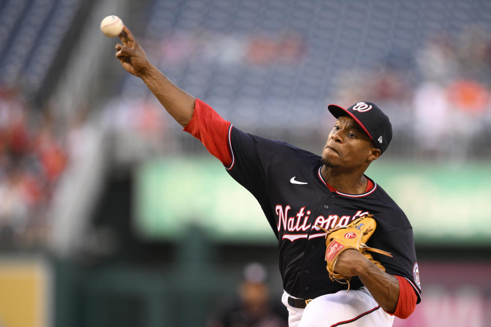 Washington Nationals starting pitcher Josiah Gray delivers during the first inning of a baseball game against the Houston Astros, Friday, May 13, 2022, in Washington. (AP Photo/Nick Wass)