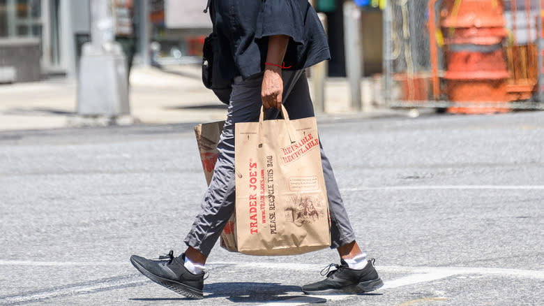 Person holding Trader Joe's bag