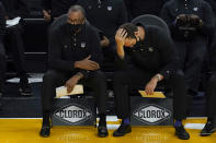 Sacramento Kings head coach Luke Walton, right, reacts on the sideline next to assistant coach Alvin Gentry during the first half of their team's NBA basketball game against the Golden State Warriors in San Francisco, Monday, Jan. 4, 2021. (AP Photo/Jeff Chiu)