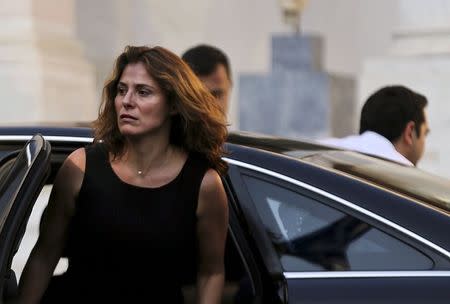 Greek Prime Minister Alexis Tsipras (R) and his wife (L) Peristera (Betty) Baziana arrive at the Maximos Mansion in Athens, Greece in this July 5, 2015 file photo. REUTERS/Alkis Konstantinidis/Files