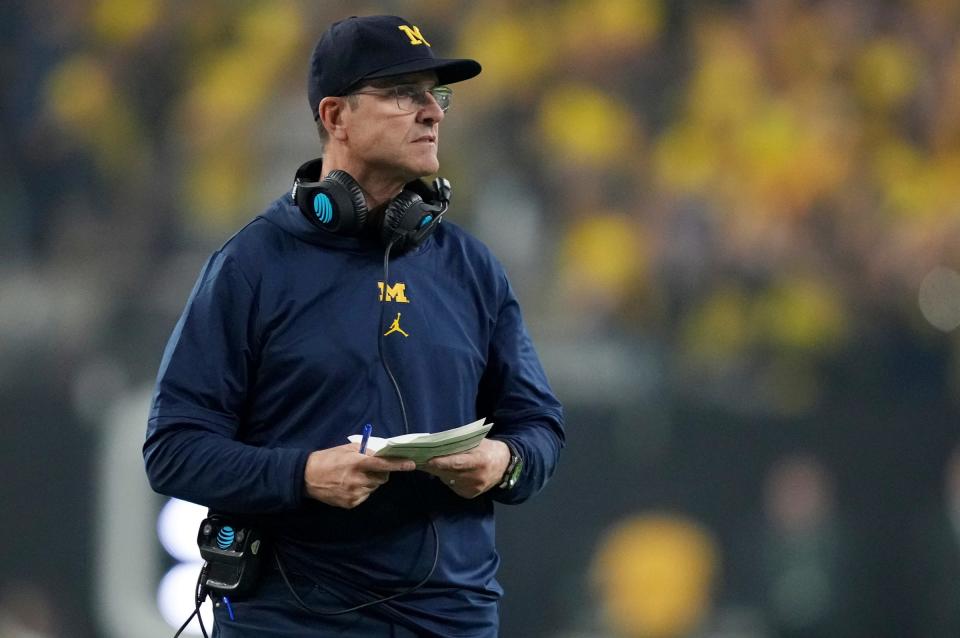 Michigan head coach Jim Harbaugh looks on during second half of the College Football Playoff national championship game against Washington at NRG Stadium in Houston, Texas on Monday, Jan. 8, 2024.