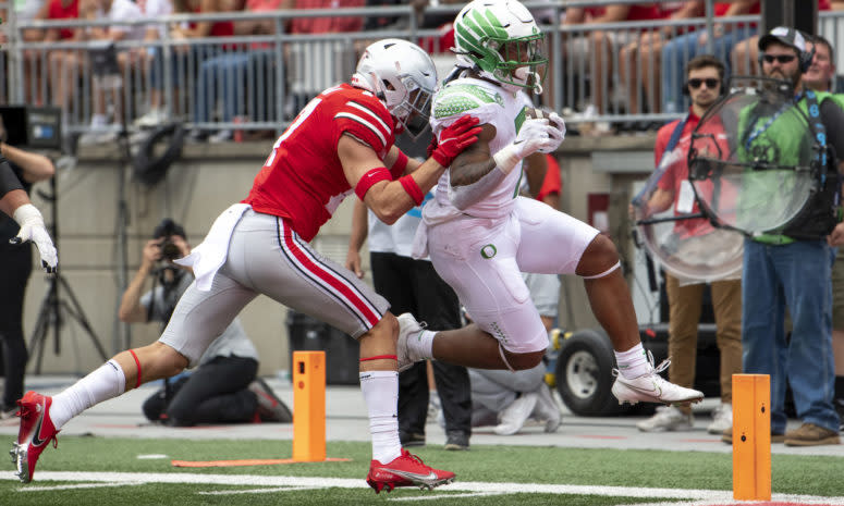 Oregon running back C.J. Verdell scores a touchdown against Ohio State.