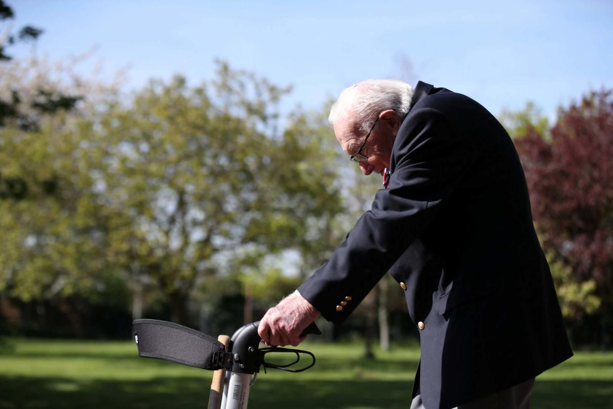 Captain Sir Tom Moore gained the nations attention during the first Covid lockdown when he pledged to walk 100-laps of his garden before his 100th birthday (REUTERS)