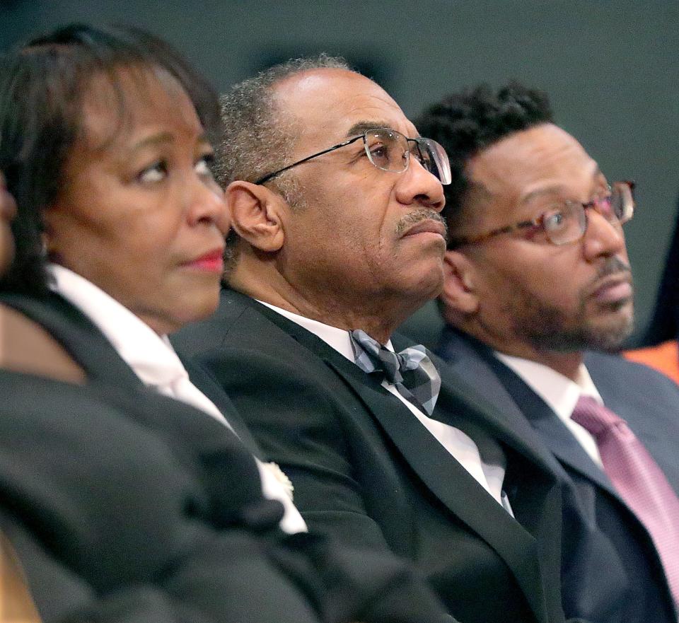 Emilia Sykes' parents, Barbara and Vernon Sykes, and her husband, Kevin Boyce, watch as the new U.S. congresswoman addresses a gathering at Firestone CLC in Akron.