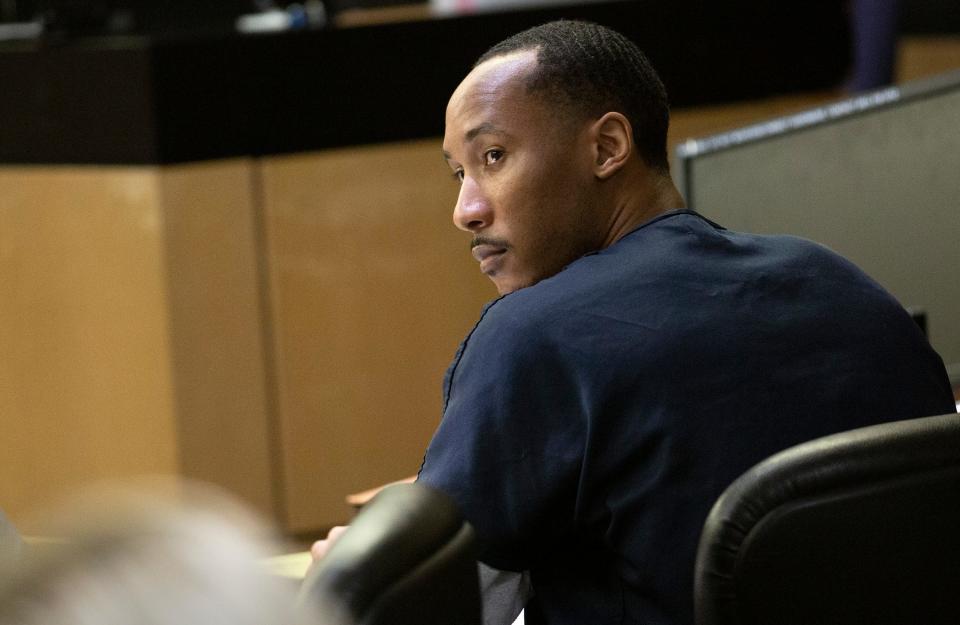 Travis Rudolph, the onetime Cardinal Newman and FSU football player, sits in court during his "stand your ground" hearing Tuesday, March 8, 2022 in West Palm Beach. Rudolph is charged with murder. He has asked the court to dismiss the case, invoking the Florida law.