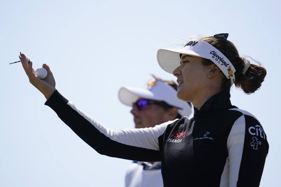 Hannah Green lines up a shot on the ninth tee during the second round of the LPGA's Palos Verdes Championship golf tournament on Friday, April 29, 2022, in Palos Verdes Estates, Calif. (AP Photo/Ashley Landis)