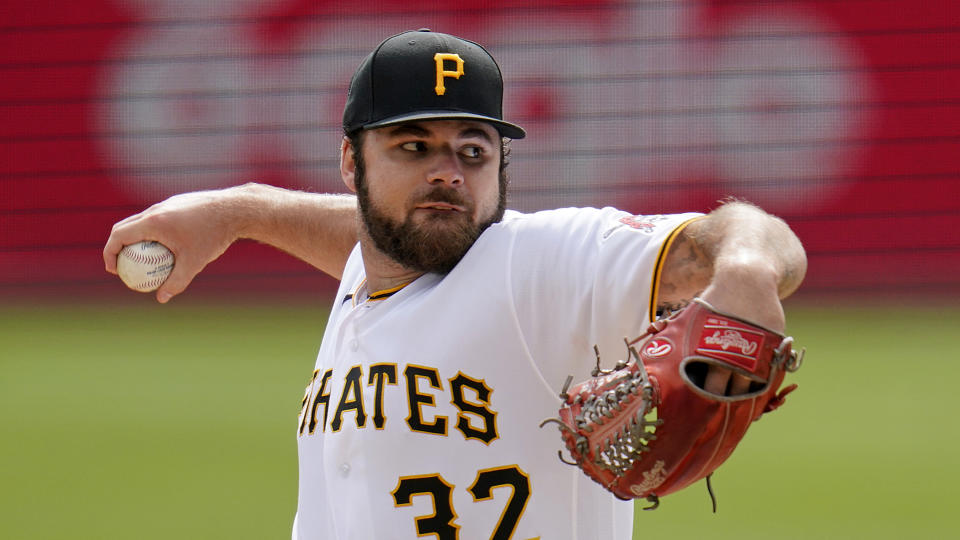 Pittsburgh Pirates starting pitcher Bryse Wilson delivers during the first inning of a baseball game against the Cincinnati Reds in Pittsburgh, Wednesday, Sept. 28, 2022. (AP Photo/Gene J. Puskar)