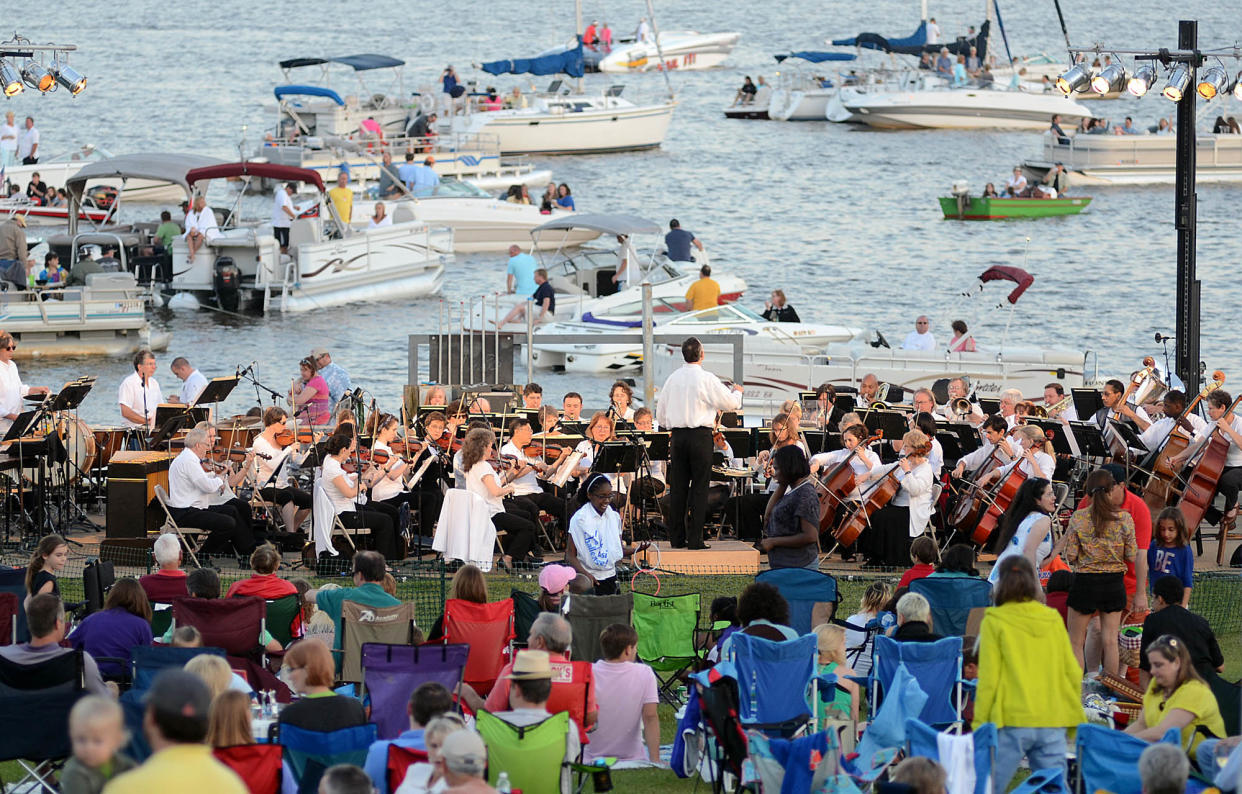 Conductor Crafton Beck and the Mississippi Symphony Orchestra entertain hundreds of lawn chair lounging music lovers and a flotilla of boaters during at a past Pepsi Pops concert at Old Trace Park on the Barnett Reservoir in Ridgeland.