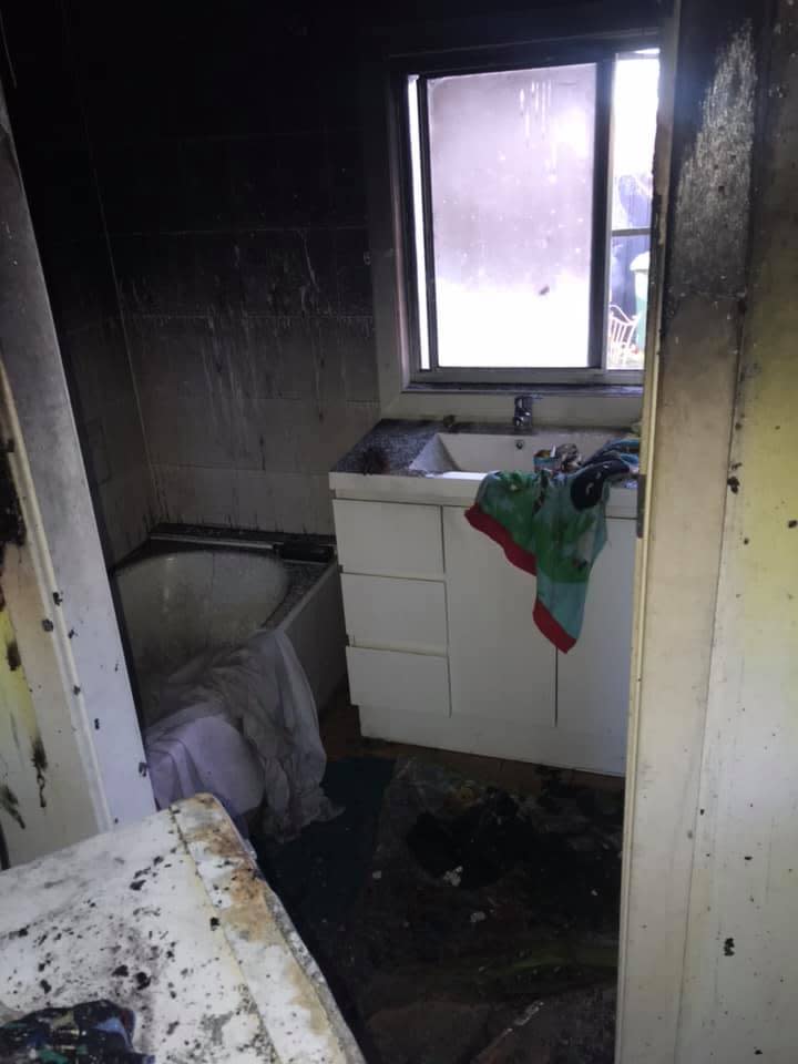 The NSW family who lives in Aberdare have now been left homeless. A photo of the bathroom blackened by the Samsung washing machine explosion. 