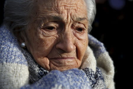 Ascension Mendieta, daughter of Timoteo Mendieta, who was shot in 1939, attends the exhumation of her father's remains at Guadalajara's cemetery, Spain, January 19, 2016. REUTERS/Juan Medina