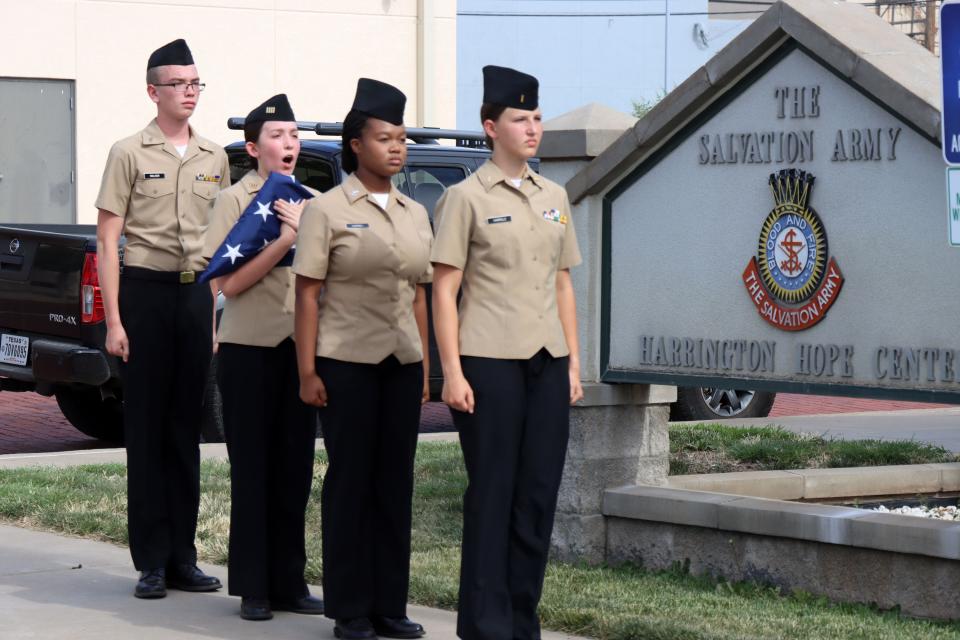 The Tascosa High School JROTC prepare to raise the American Flag on Flag Day at the Salvation Army Harrington Hope Center Tuesday to honor Majors Ernest and Debra Hull as they end their service in the Texas Panhandle.