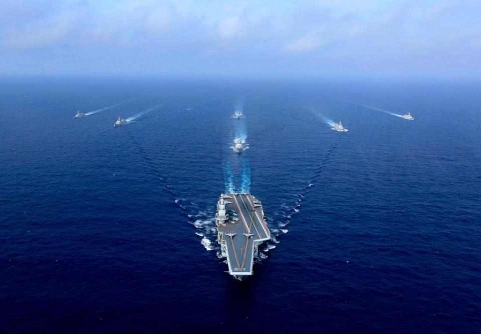 China's sole operational aircraft carrier, the Liaoning (C), sailing during a drill at sea. Source: AFP via Getty Images