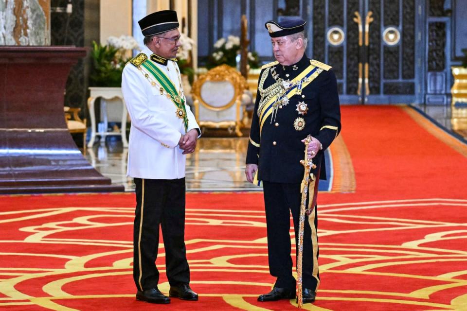 Sultan Ibrahim Iskandar is known to share close ties with prime minister Anwar Ibrahim (AP)