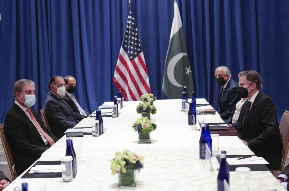 FILE - In this Sept. 23, 2021, file photo Pakistani Foreign Minister Shah Mahmood Qureshi, left, meets with U.S. Secretary of State Antony Blinken, right, on the sidelines of the 76th UN General Assembly in New York. The Taliban’s takeover of Kabul has deepened the mutual distrust between the U.S. and Pakistan, two putative allies who have tangled over Afghanistan. The Biden administration looking for new ways to stop terrorist threats in Afghanistan, will likely look again to Pakistan, which remains critical to U.S. intelligence and national security because of its proximity to Afghanistan and connections to the Taliban leaders now in charge. ( (Kena Betancur/Pool Photo via AP, File)