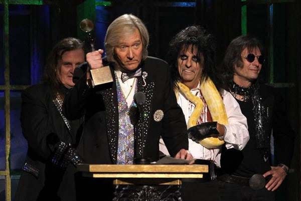 Former Akron resident Neal Smith delivers his acceptance speech with Michael Bruce, Alice Cooper and Dennis Dunaway at the Rock & Roll Hall of Fame induction ceremony March 14, 2011, in New York.