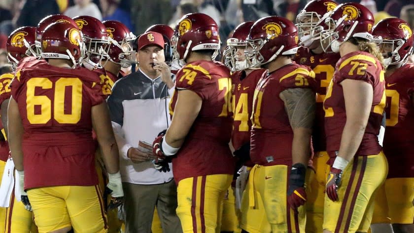 USC Coach Clay Helton and the Trojans face the Nittany Lions of Penn State in the Rose Bowl on Jan. 2, 2016.