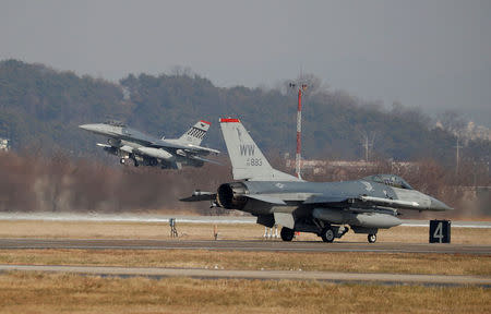 U.S. Air Force F-16 fighter jets take part in a joint aerial drill exercise called 'Vigilant Ace' between U.S. and South Korea, at the Osan Air Base in Pyeongtaek, South Korea, December 6, 2017. REUTERS/Kim Hong-Ji