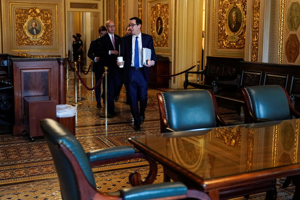 U.S. Secretary of the Treasury Mnuchin walks from a meeting for a coronavirus relief package in Washington