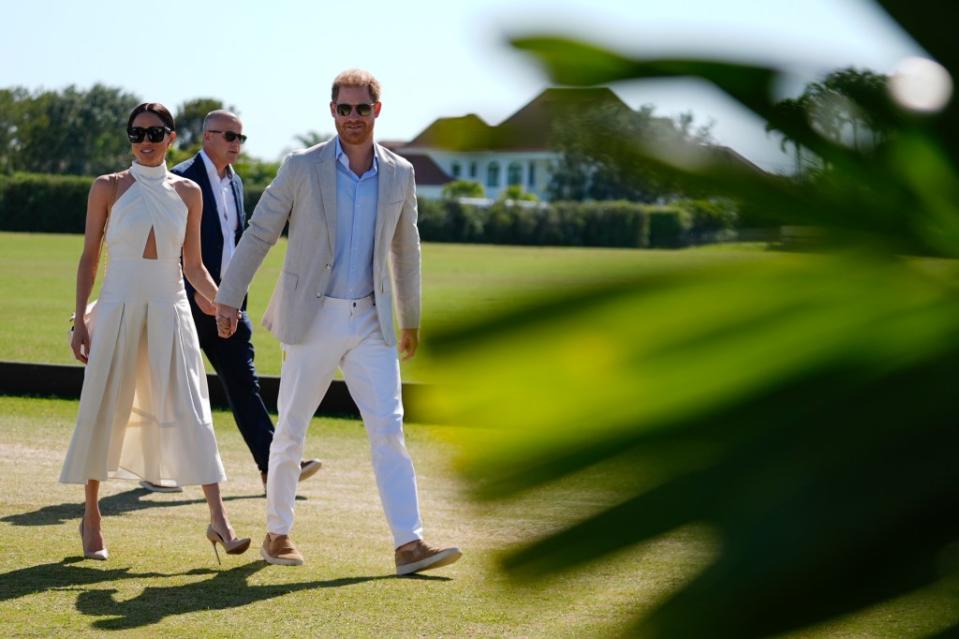 Harry and Meghan arrive for the 2024 Royal Salute Polo Challenge to benefit Sentebale. AP