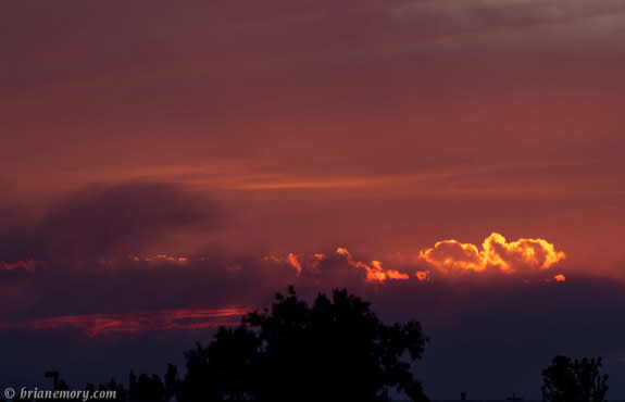 Airborne particles and droplets called aerosols can make for colorful sunsets. Above, a sunset during an aerosol-ejecting Colorado wildfire in June 2012.