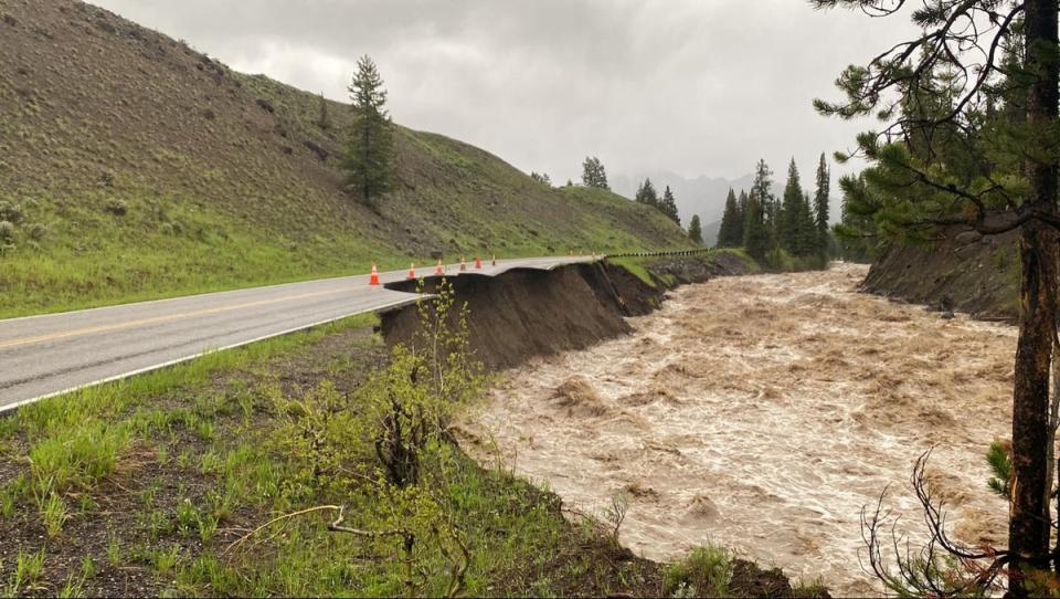 High water levels in the Lamar River erode Yellowstone National Park's Northeast Entrance Road, where the park was closed due to heavy flooding, rockslides, extremely hazardous conditions near Gardiner, Montana, U.S. June 13, 2022 (via REUTERS)