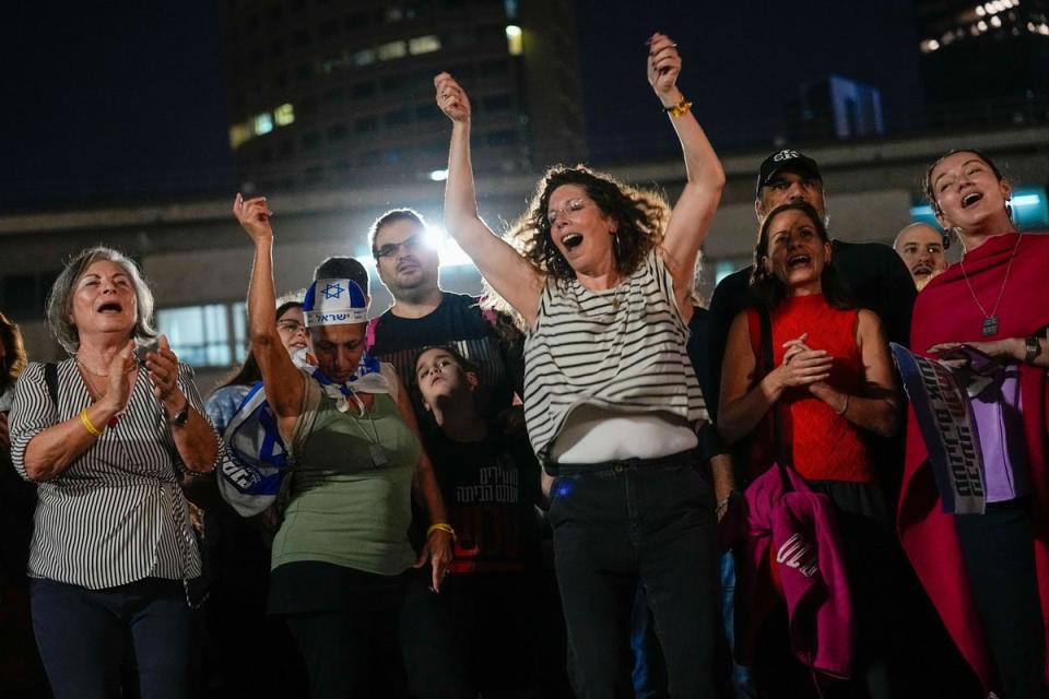 People react in Tel Aviv, Israel (AP)