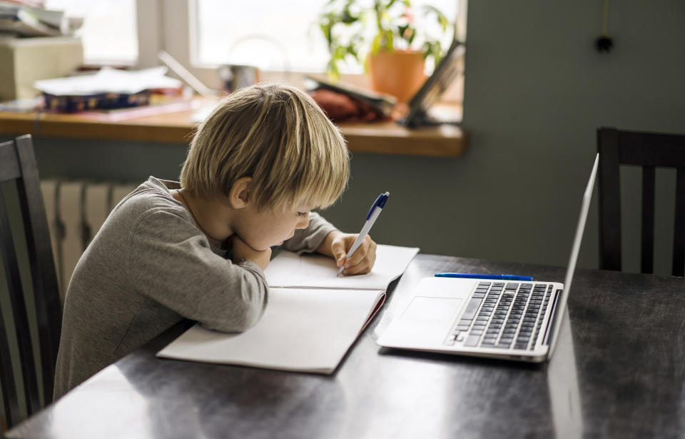 School boy learning form home