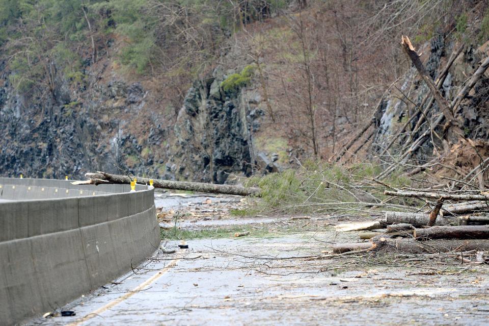 Rocks, trees and other debris cover I-40 at mile marker 7.5 on Feb. 23, 2019. A rockslide Friday night that continued into Saturday closed the highway in both directions. The NC Department of Transportation expects I-40 to be closed for a week as they clean up and stabilize the area which still had falling trees and rocks Saturday afternoon.