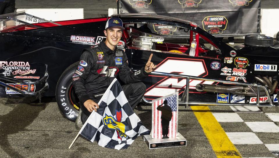 Mike Christopher Jr., driver of the #7, celebrates after winning The Jennerstown Salutes 150 for the NASCAR Whelen Modified Tour at Jennerstown Speedway in Jennerstown, Pennsylvania on May 28, 2022. (Nate Smallwood/NASCAR)