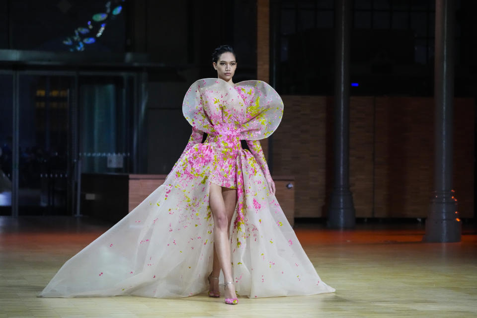 A model wears a creation for the Elie Saab Spring-Summer 2022 Haute Couture fashion collection, in Paris, Wednesday, Jan. 26, 2022. (AP Photo/Francois Mori)