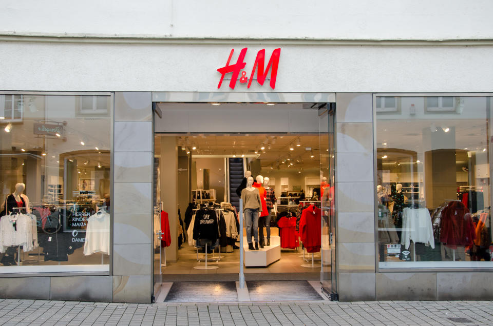 Soest, Germany - December 18, 2017: H&M sign on the wall. H&M Hennes & Mauritz AB is a Swedish multinational clothing-retail company, clothing for men, women, teenagers and children.