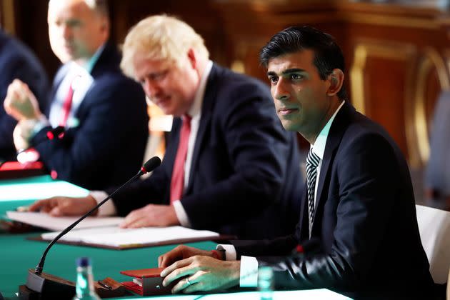 Boris Johnson sitting next to Rishi Sunak in July 2020