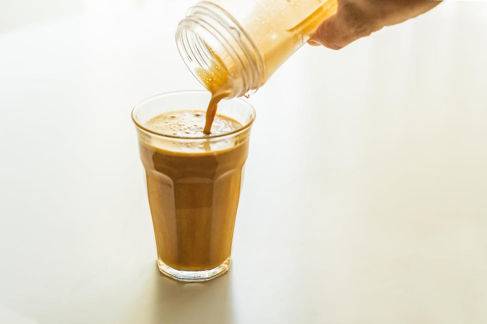 Bulletproof coffee gets its creamy color from butter that&rsquo;s been blended into the drink in a high-speed blender. (Photo: t.maz via Getty Images)