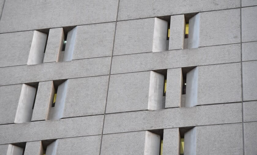 White lights flash from inside the Metropolitan Detention Center where ICE (U.S.Immigration and Customs Enforcement) detainees are held, as protestors (out of frame) rally outside the building during a 'Families Belong Together March' against the separation of children of immigrants from their parents, in downtown Los Angeles, California on June 14, 2018. - Rallies are taking place in 46 cities nationwide to register opposition to new family separation policies. (Photo by Robyn Beck / AFP) (Photo credit should read ROBYN BECK/AFP via Getty Images)