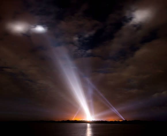 Floodlights illumine sky over Space Launch Complex 37 at Cape Canaveral Air Force. Station in Florida