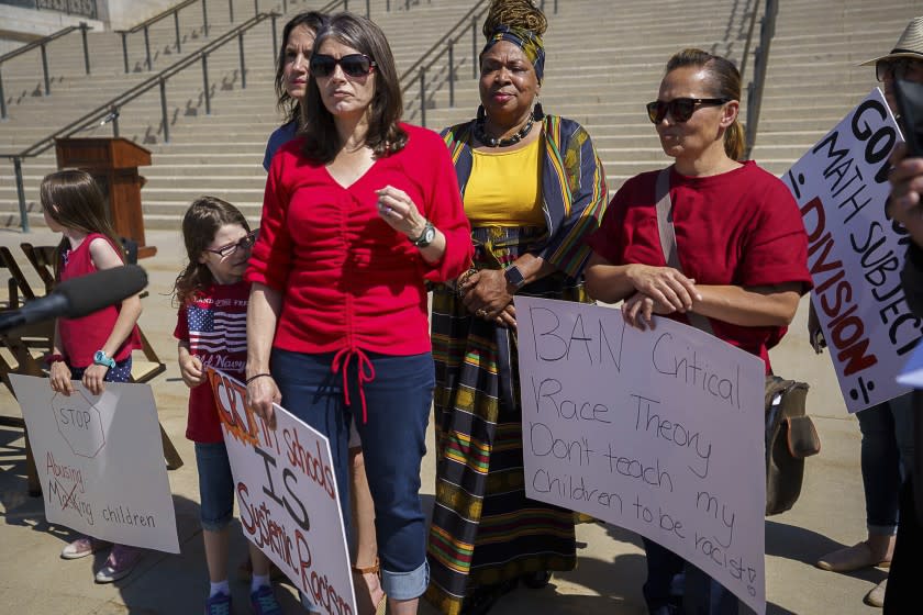 Monica Wilbur expresses her opposition to critical race theory at the State Captiol in Salt Lake City on May 19, 2021.