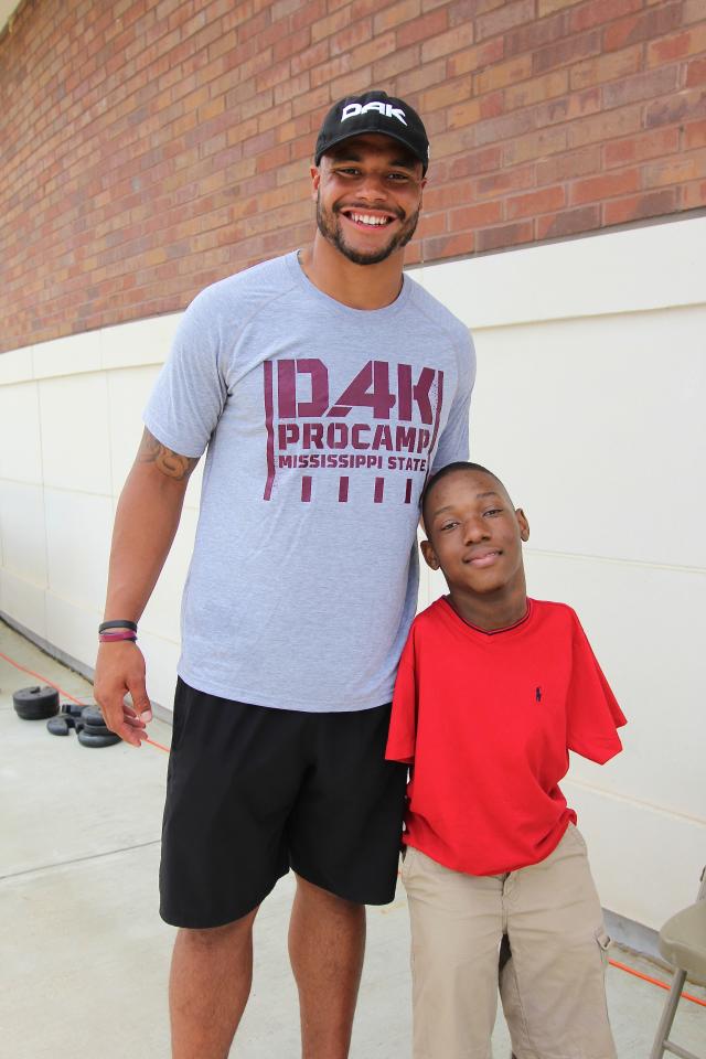 Perfect Illustration: Dak Prescott's bond with fan with no arms