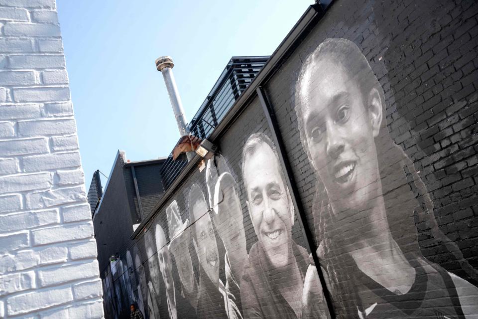 Brittney Griner, who is currently detained in Russia, is depicted in a mural created by artist Isaac Campbell in Washington, DC. Campbell said the mural shows Griner and other American hostages and wrongful detainees.