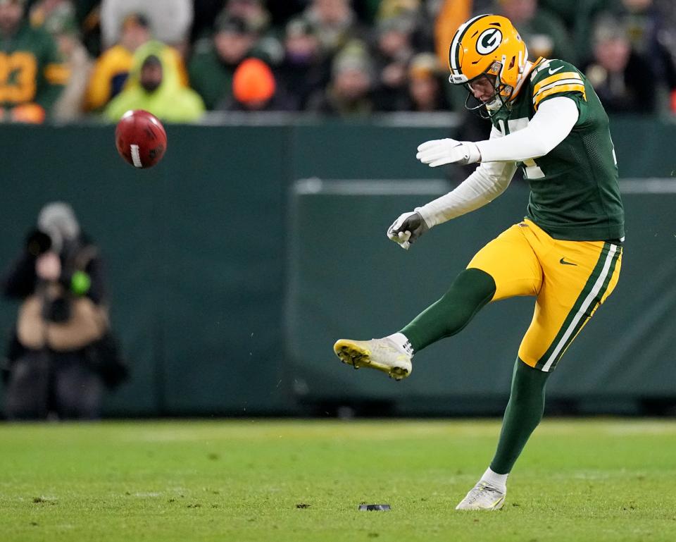 Green Bay Packers place kicker Anders Carlson (17) kicks off during the first quarter of their game against the Kansas City Chiefs Sunday, December 3, 2023 at Lambeau Field in Green Bay, Wisconsin.