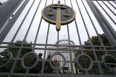 A city court building is seen through its gate in Moscow, September 24, 2014. REUTERS/Maxim Zmeyev