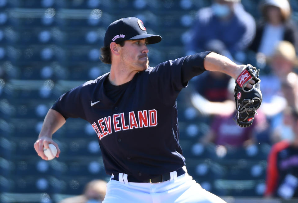 GOODYEAR, ARIZONA - MARCH 01: Shane Bieber #57 of the Cleveland Indians delivers a first inning pitch against the Kansas City Royals during a spring training game at Goodyear Ballpark on March 01, 2021 in Goodyear, Arizona. (Photo by Norm Hall/Getty Images)