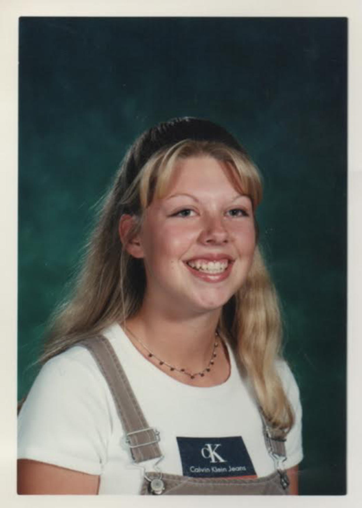 Salli Garrigan's junior class photo. She was wearing the same outfit on the day of the shooting in 1999. (Courtesy Salli Garrigan)
