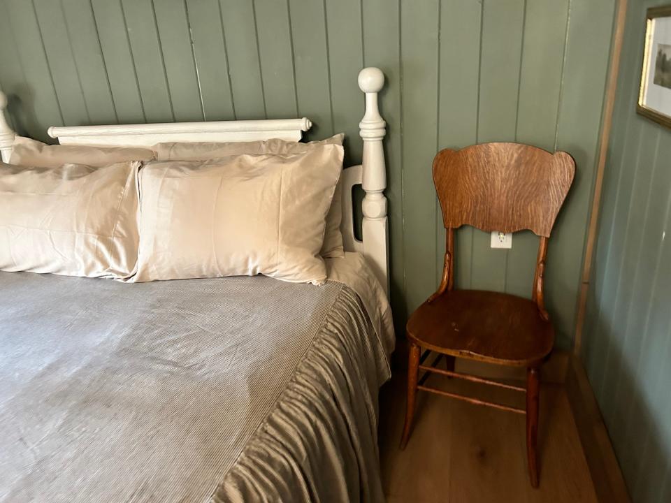 chair next to bed  in Rapunzel's Cottage