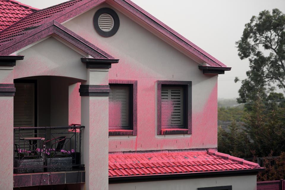 Homes in Sydney's north were coated in pink fire retardant, which was dropped from the sky, to help ease the out-of control bush fire on Canoon Rd and Barwon Avenue South Turramurra.