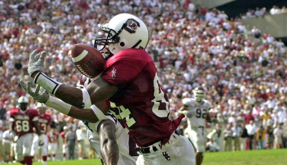 USC receiver Jermale Kelly reaches out to grab the go-ahead touchdown pass on a fade pass from QB Erik Kimrey that gave the Gamecocks a 20-19 lead over Mississippi State on Sept. 23, 2000 at Williams-Brice Stadium. USC went on to win 23-19.