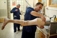 A technician produces artificial limbs at Red Cross Physical Rehabilitation Centre in Erbil, Iraq April 2, 2017. Picture taken April 2, 2017. REUTERS/Suhaib Salem